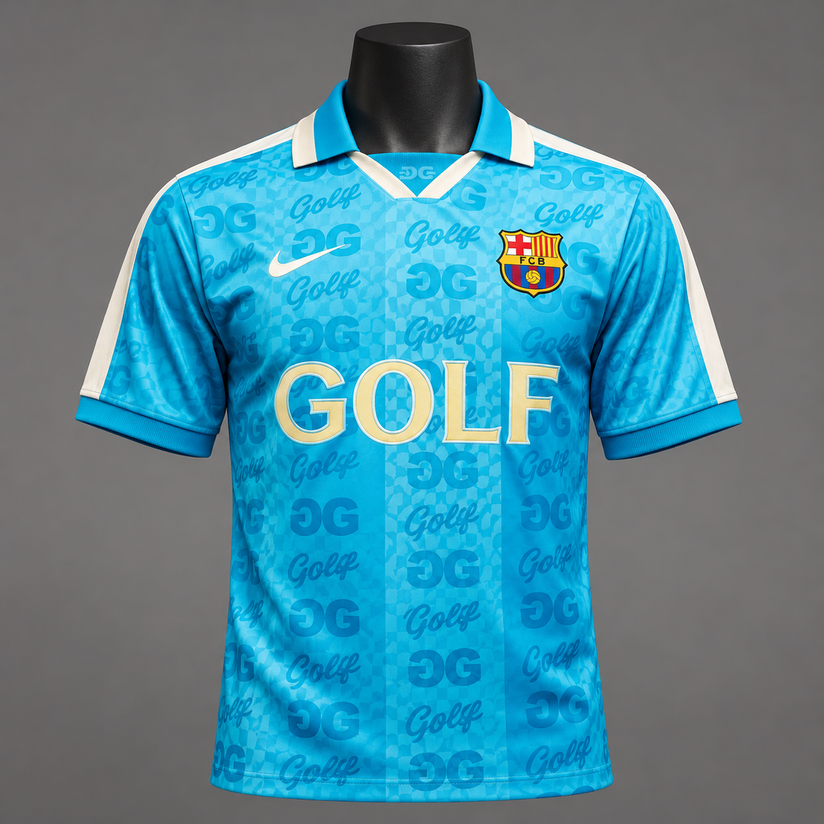 FC Barcelona x Golf Wang turquoise short sleeve jersey with all-over blue Golf monogram, cream GOLF chest lettering, FC Barcelona crest and white collar on mannequin